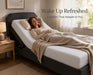 Woman relaxing on a Visco Therapy mattress on an electric adjustable bed with the head section raised