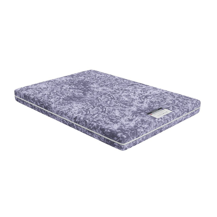 Essential Eco Comfort Waterproof Sprung Mattress – shown on a bed in a styled room