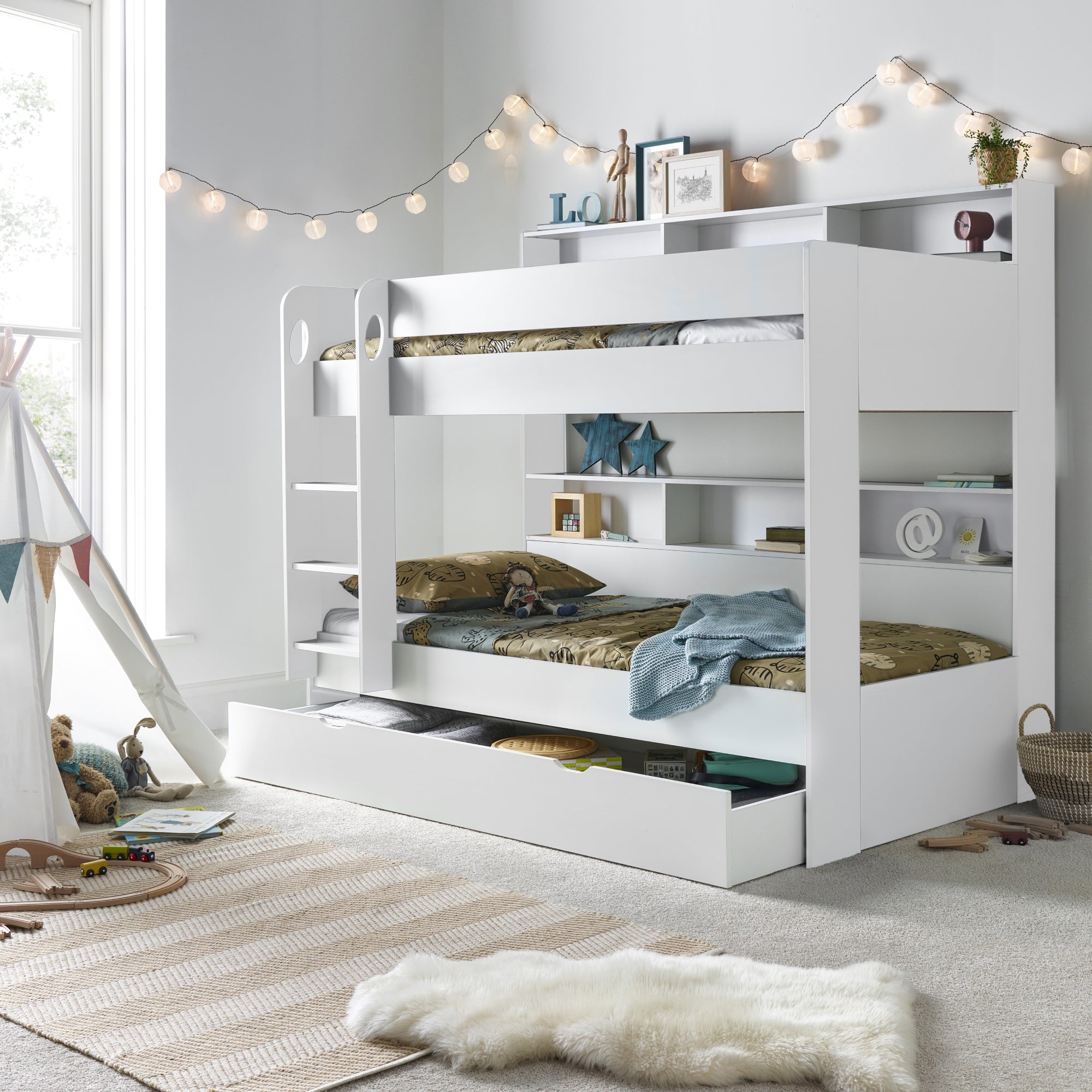 Multifunctional bunk bed with built-in storage, ideal for small children's rooms.